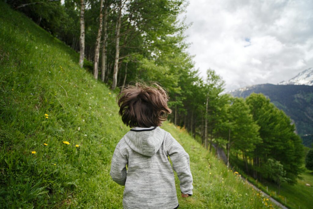 Toddler running outside